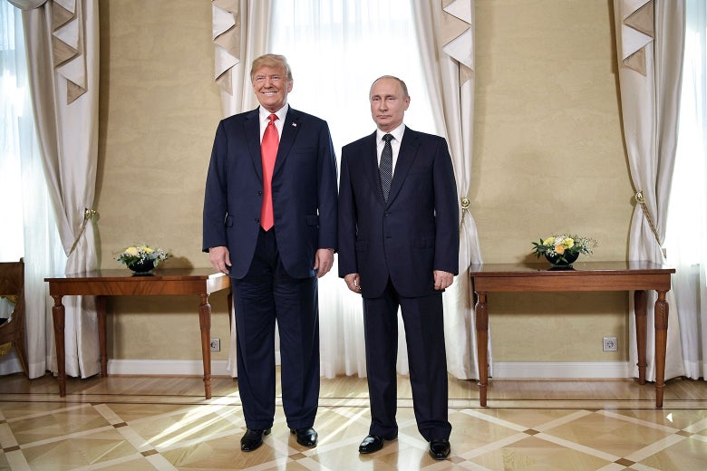 President Donald Trump and Russia's President Vladimir Putin pose ahead of a meeting in Helsinki, on July 16.
